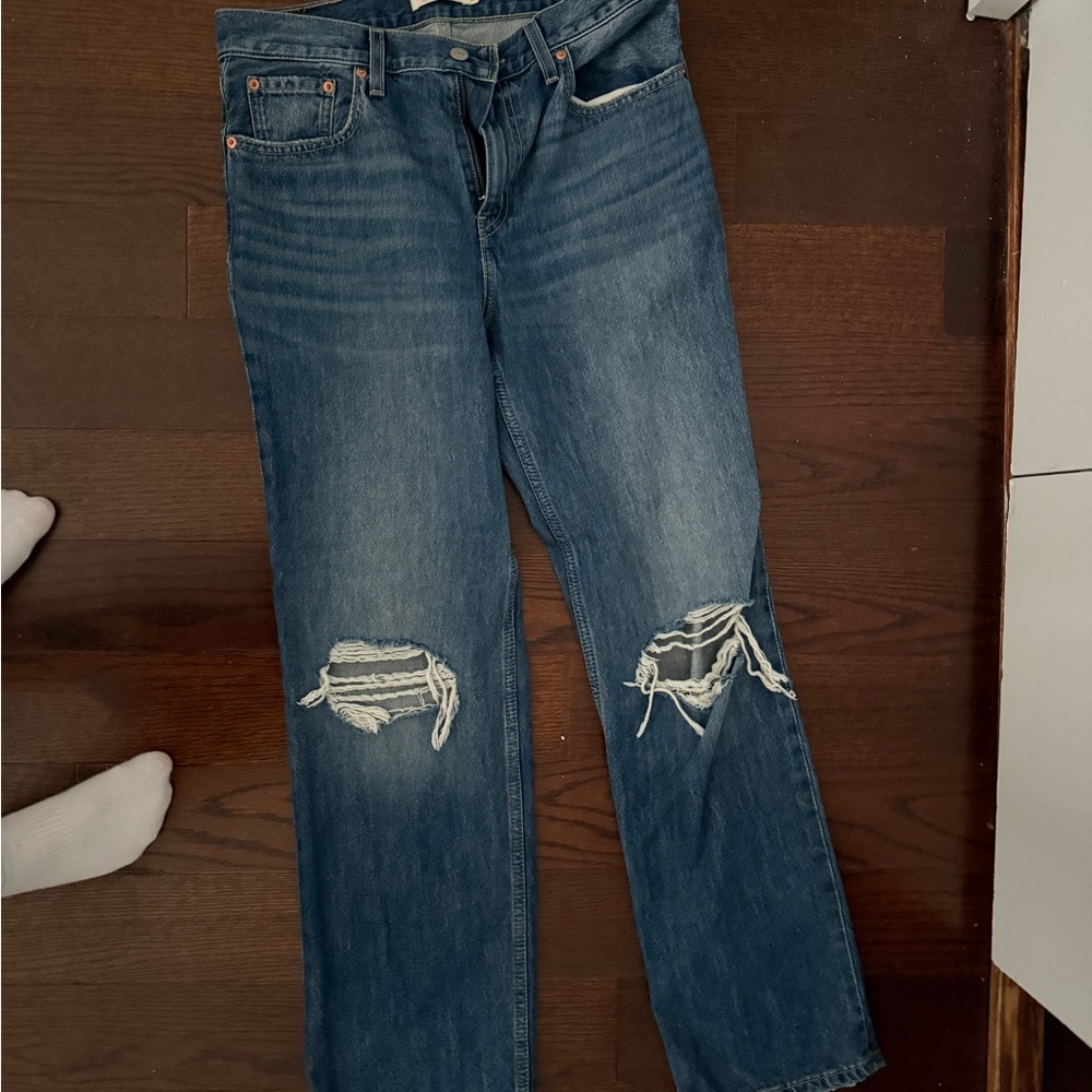 Distressed Blue Jeans